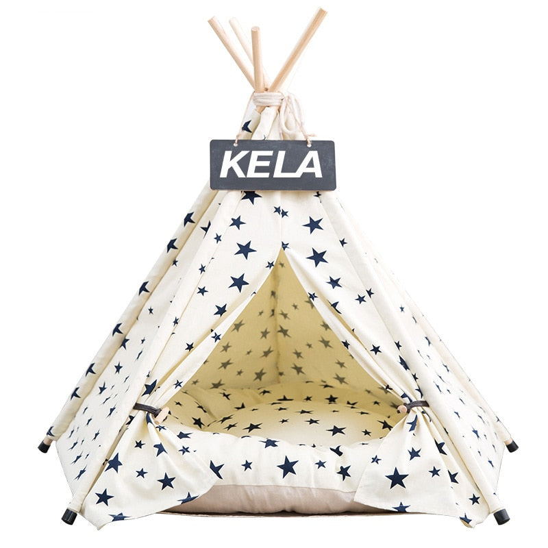 Beige star dog teepee tent bed with a comfortable cushioned interior and wooden support poles for small pets