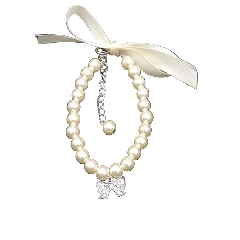 White Paws For Royalty Pearl Rhinestone Dog Collar featuring elegant pearl accents and sparkling crystal rhinestones, a luxury necklace-style collar for small dogs and cats.