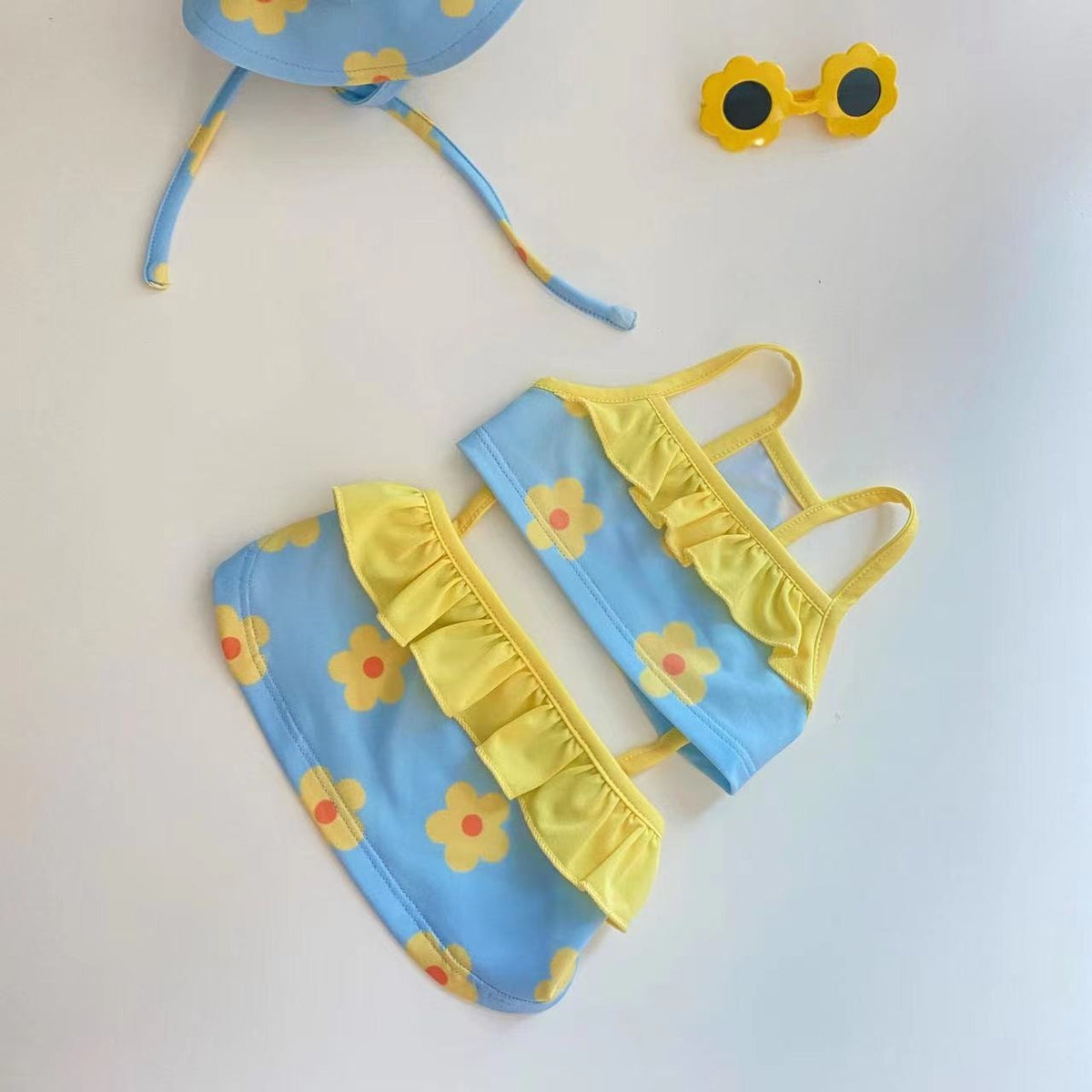 Blue Paws For Royalty dog bikini jumpsuit for small dogs, designed for beach vacations, pool parties, and summer outings