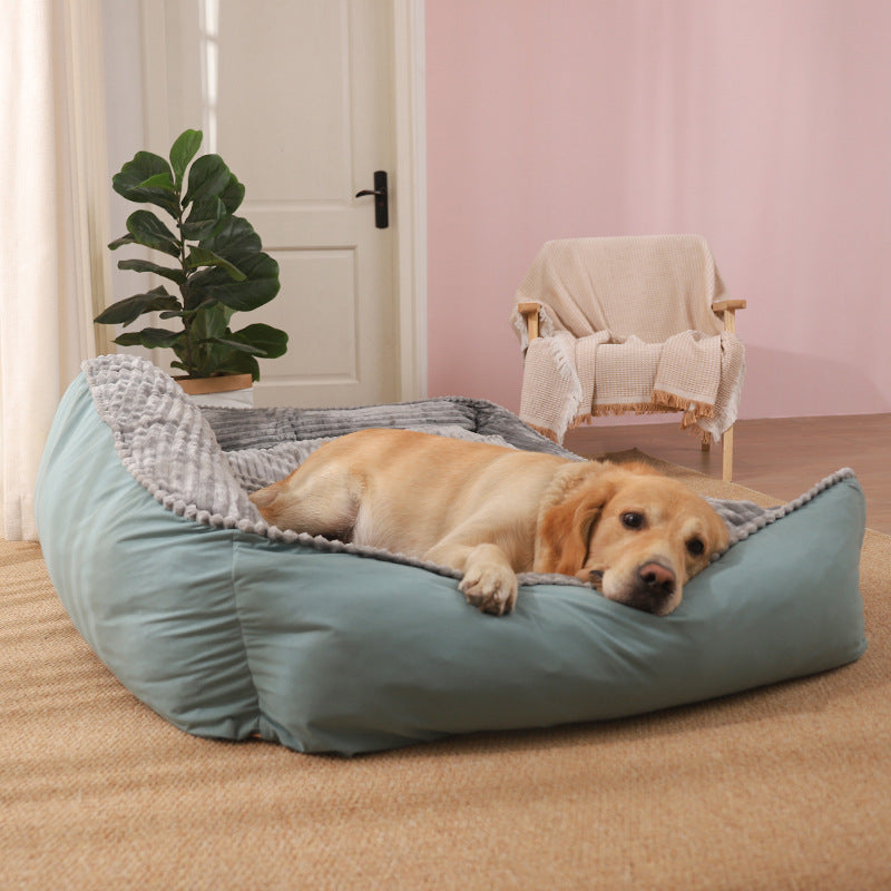 Dog lying comfortably on a spacious orthopedic dog bed with high-density foam support for restful sleep and relaxation