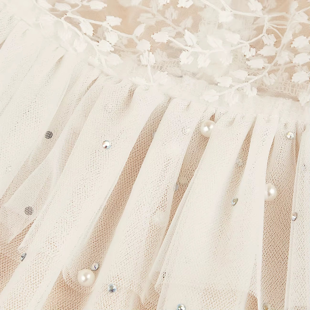 Close-up of the details and quality construction of the Paws For Royalty luxury dog wedding dress for small dogs