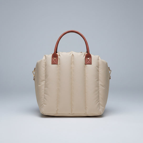 Paws For Royalty luxury dog carrier bag and travel bed in light khaki, designed for small dogs and cats