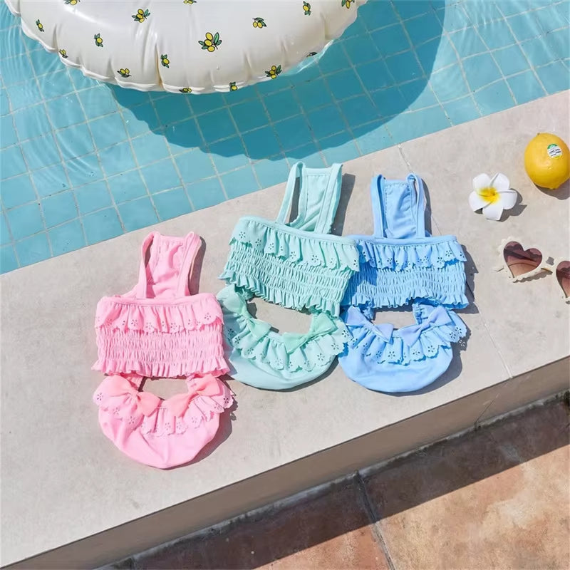 Dog swimsuit with matching swim cap for small dogs made from lightweight quick-dry fabric