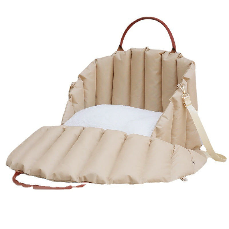 Light khaki Paws For Royalty luxury dog carrier bag and travel bed with a soft interior for small pets