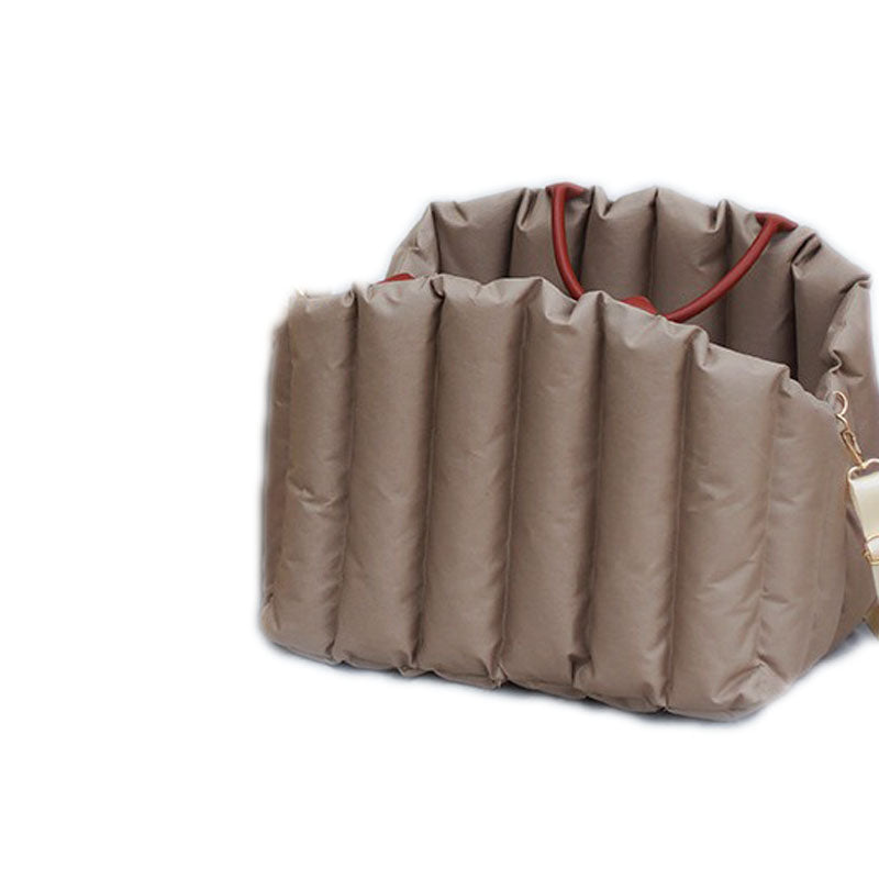 Dark khaki luxury dog carrier bag and travel bed featuring a stylish soft-sided design for small dogs and cats