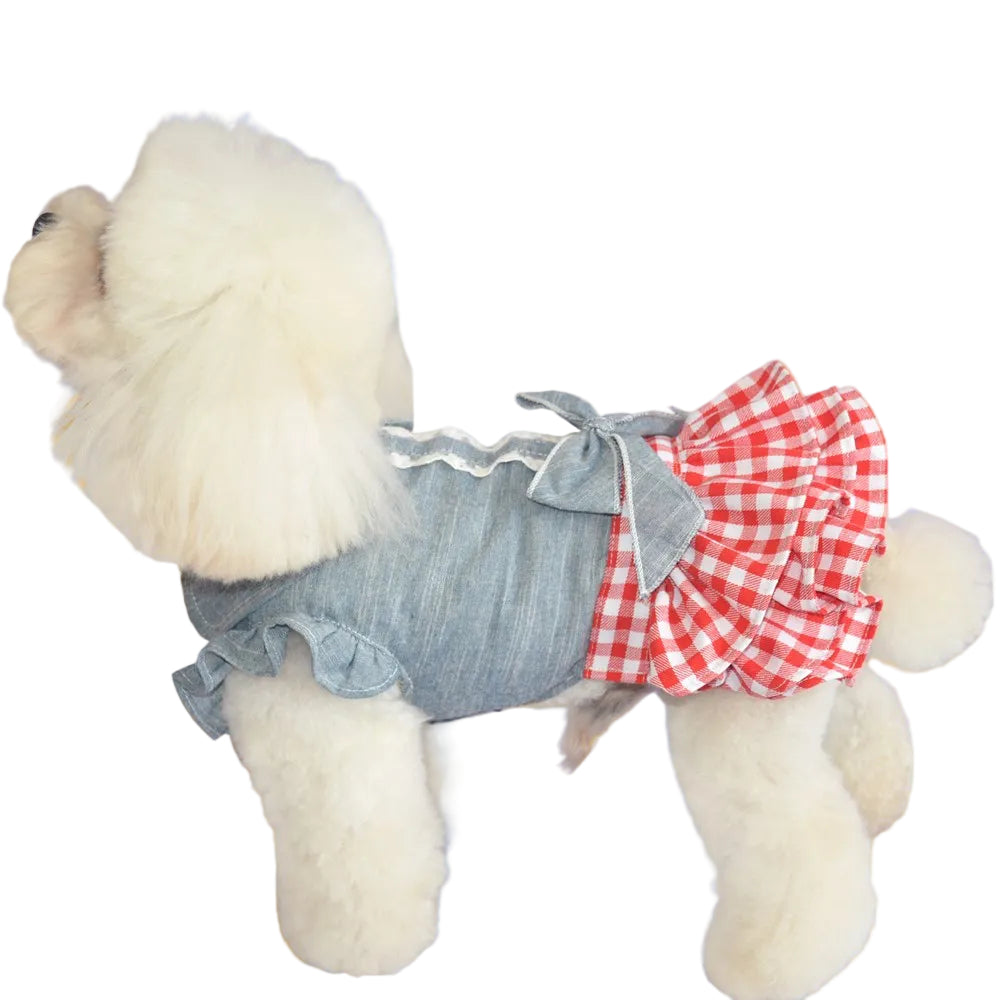 Small dog wearing a red and white grid denim-inspired dress in side view, featuring a lightweight and comfortable design for everyday wear