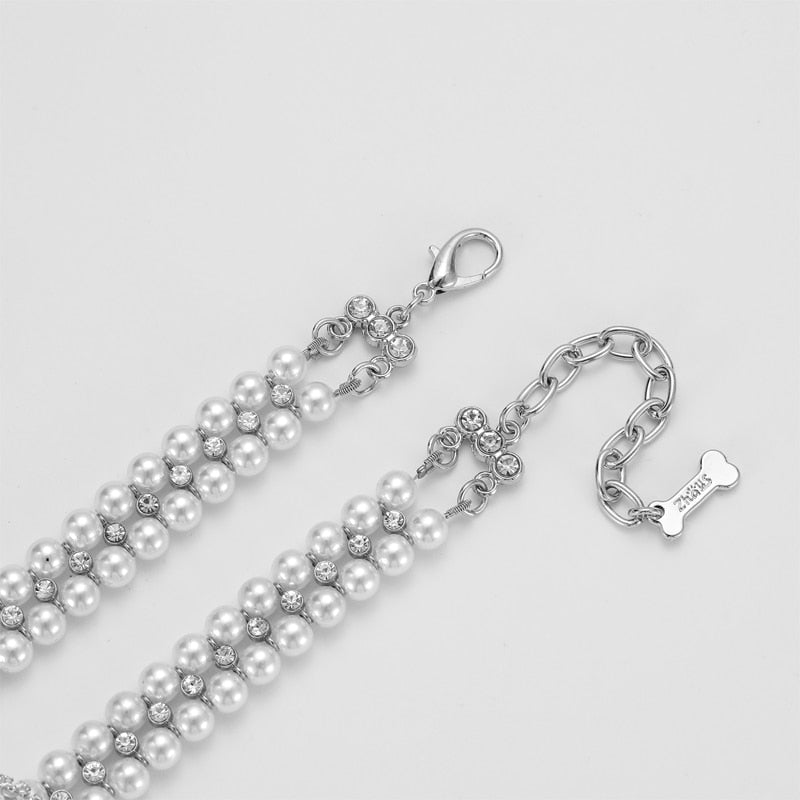 Close-up of the Paws For Royalty Diamond Pearl Dog Collar color, showcasing sparkling rhinestone beads, pearl detailing, and secure collar clasp.